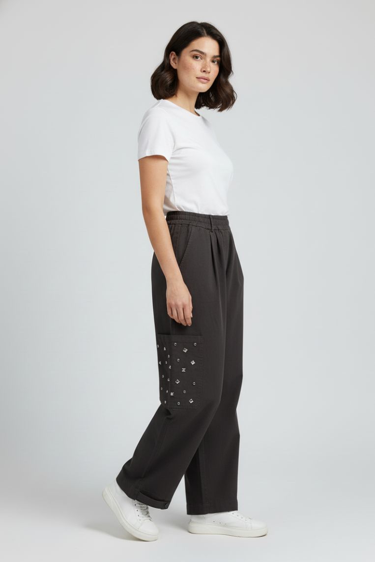 TROUSERS WITH STUDS IN THE POCKET